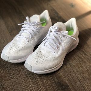 All white Nike tennis shoes